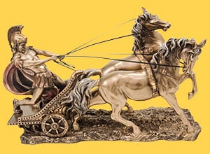 golden bust of a warrior on a chariot with horses