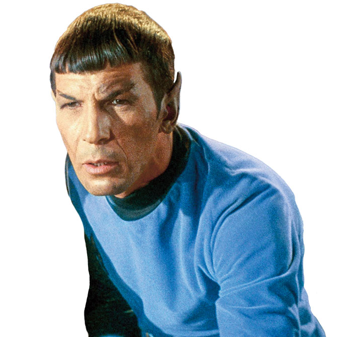 A man with pointed ears wearing a blue shirt