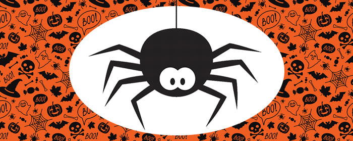 A cartoon spider hangs against a Halloween-themed orange background
